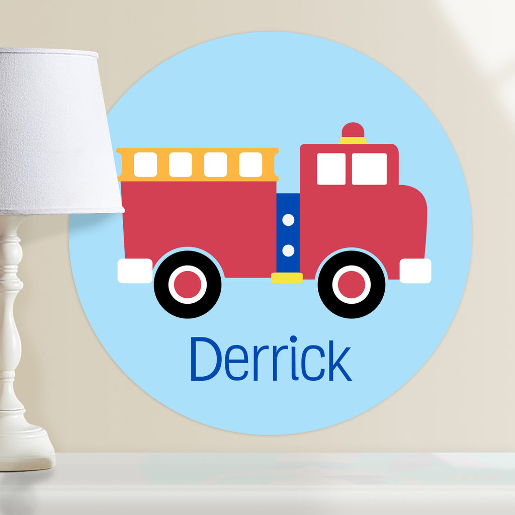 Firetruck personalized kids circular wall decal.  Red fireruck on a light blue background.