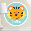Kids personalized circular wall decal. Happy baby tiger portrait on a blue-green background.