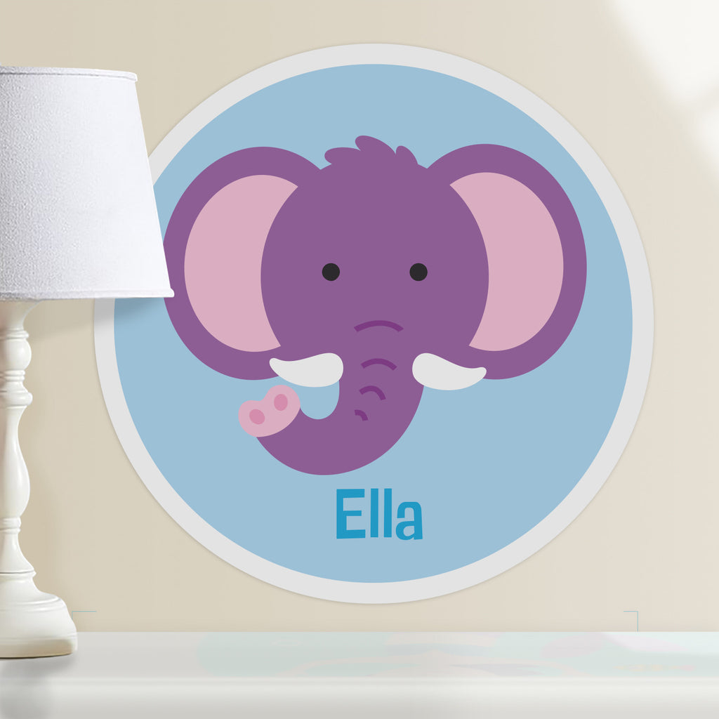 Kids personalized circular wall decal. Happy baby elephant portrait. Purple and pink on a light blue background.