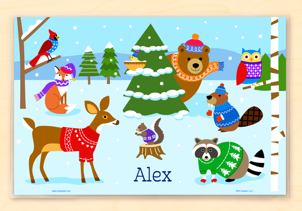 Image showing front and back of a Personalized place mat for kids with woodland animals in a winter scene. Animals are wearing sweaters and knit hats.  Child name is at the bottom center.  